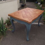 Louis XV-style extension table in solid cherry.