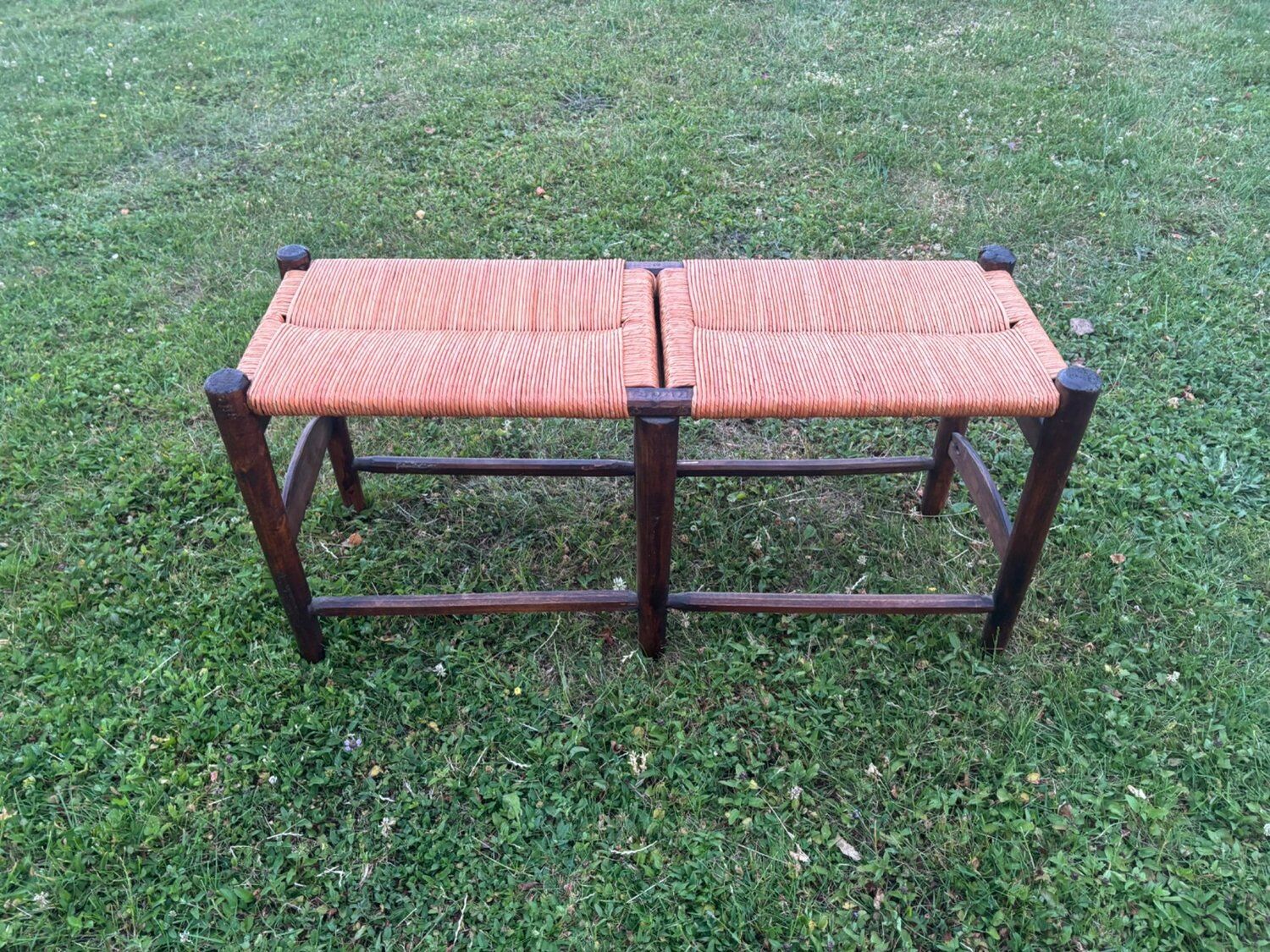 Two-seater straw bench, French rural style, wood and rush, early 20th century.