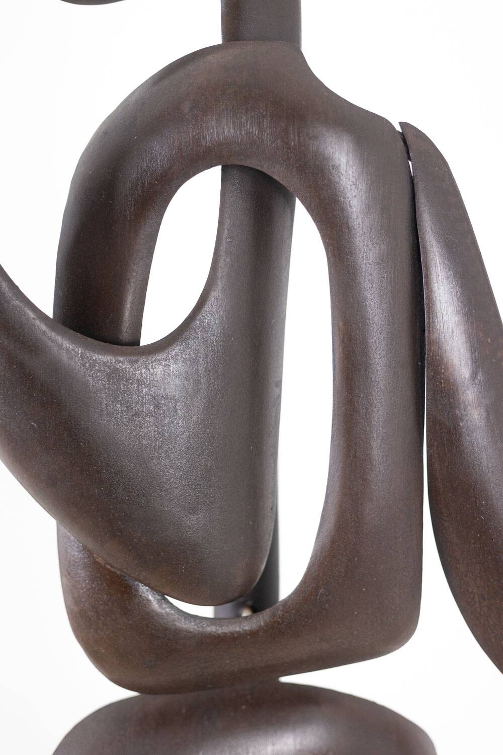 Antonine de Saint Pierre. Curved metal sculpture. Contemporary work.