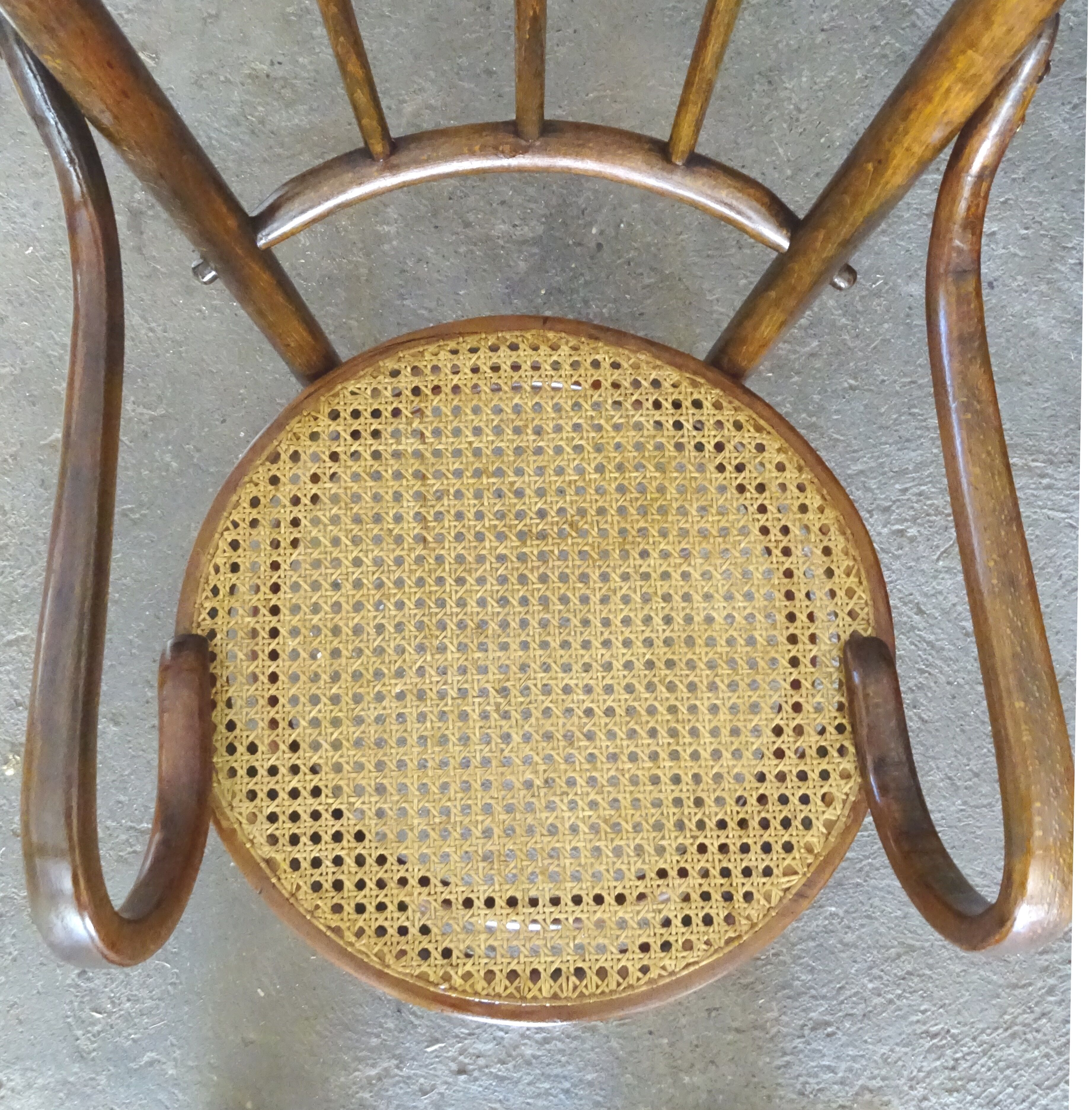 Small canned armchair; in curved wood, bistro, 1890