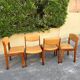 4 Scandinavian chairs in Baumann style made of solid wood and beige leather, 1960.