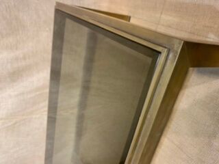 Brass coffee table and smoked glass