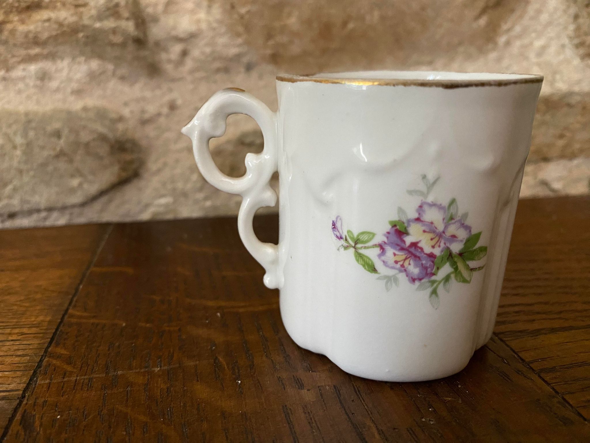 Porcelain cup fine decoration flowers and golden edge