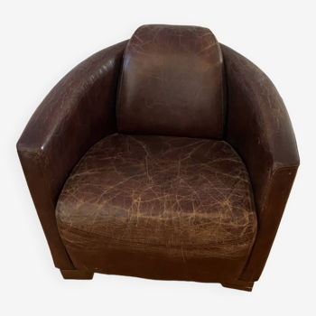 Leather club chair with pretty worked legs. in designer style wood