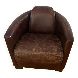 Leather club chair with pretty worked legs. in designer style wood