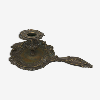 Old hand candle holder in bronze style rocaille louis xv