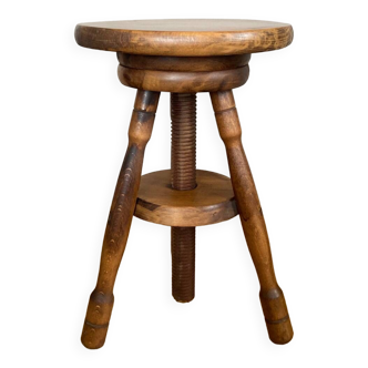 Tabouret tournant en bois massif piétement tripode époque XXe