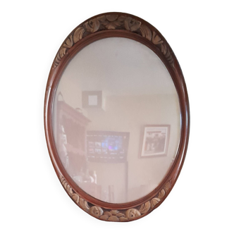 Art deco worked oval wooden frame