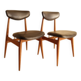 Pair of modernist Scandinavian chairs in teak and black faux leather.