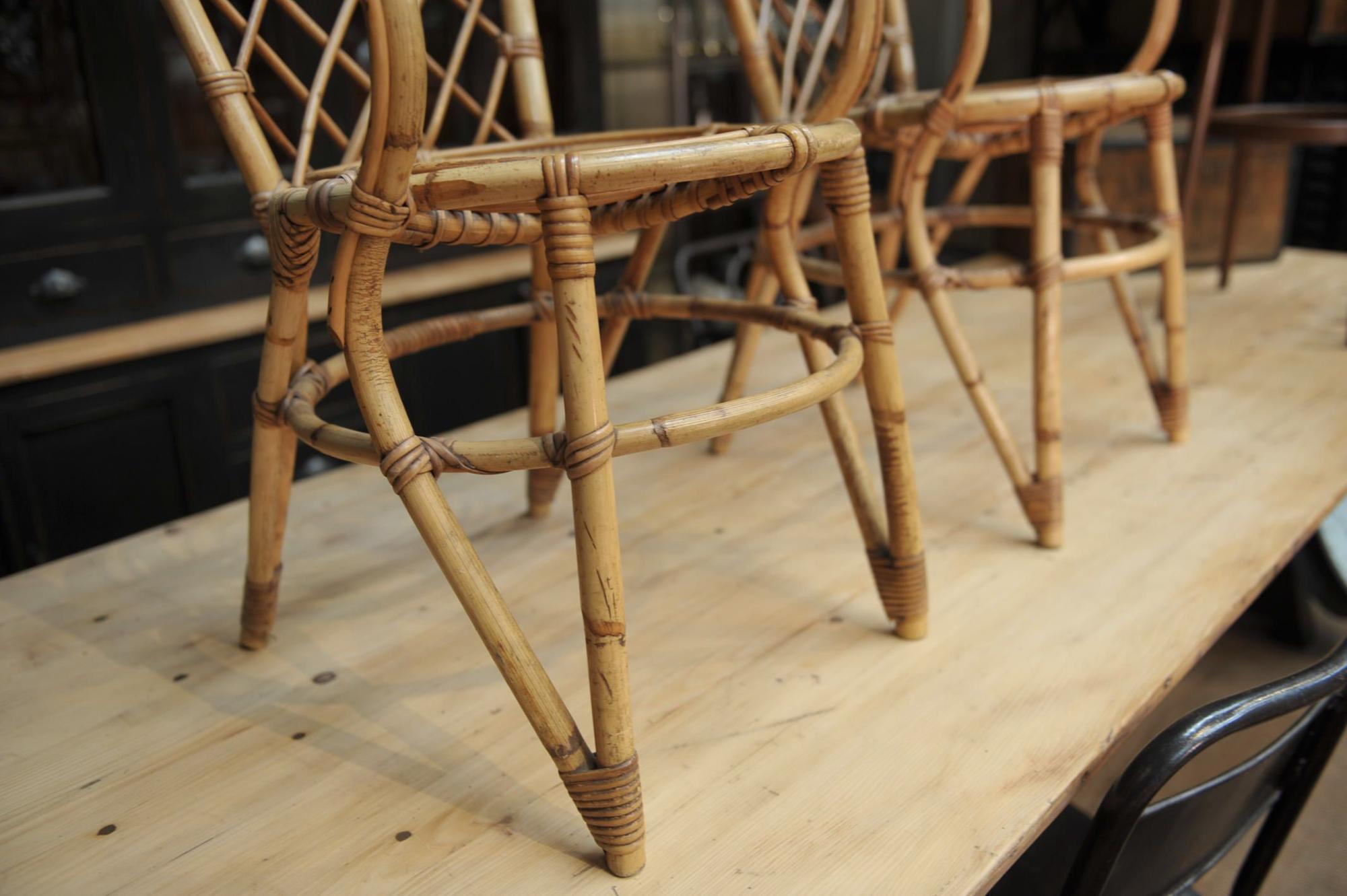 Pair of chairs in rattan 1960 by Louis Sognot