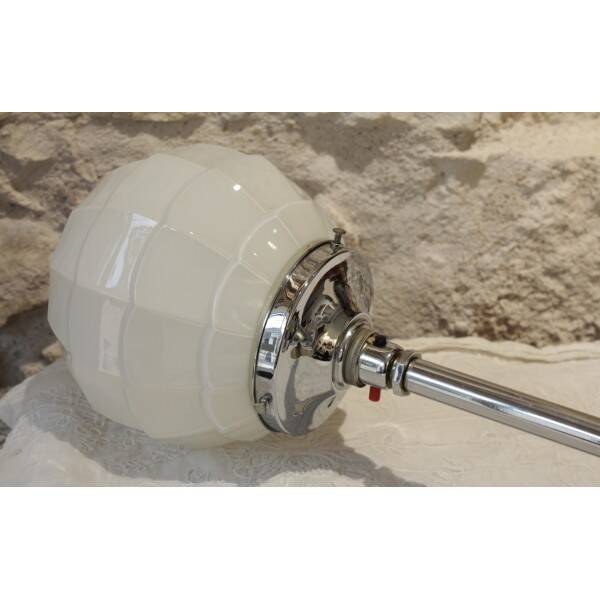 Chrome metal lamp with glass globe, Art Deco style, 20th century period.
