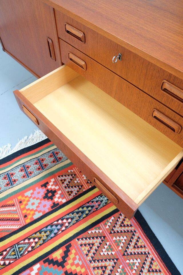 Teak ring buffet in vintage retro style from the 60s-70s.