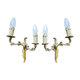 Pair of appliques with two arms of light with a leafy decoration