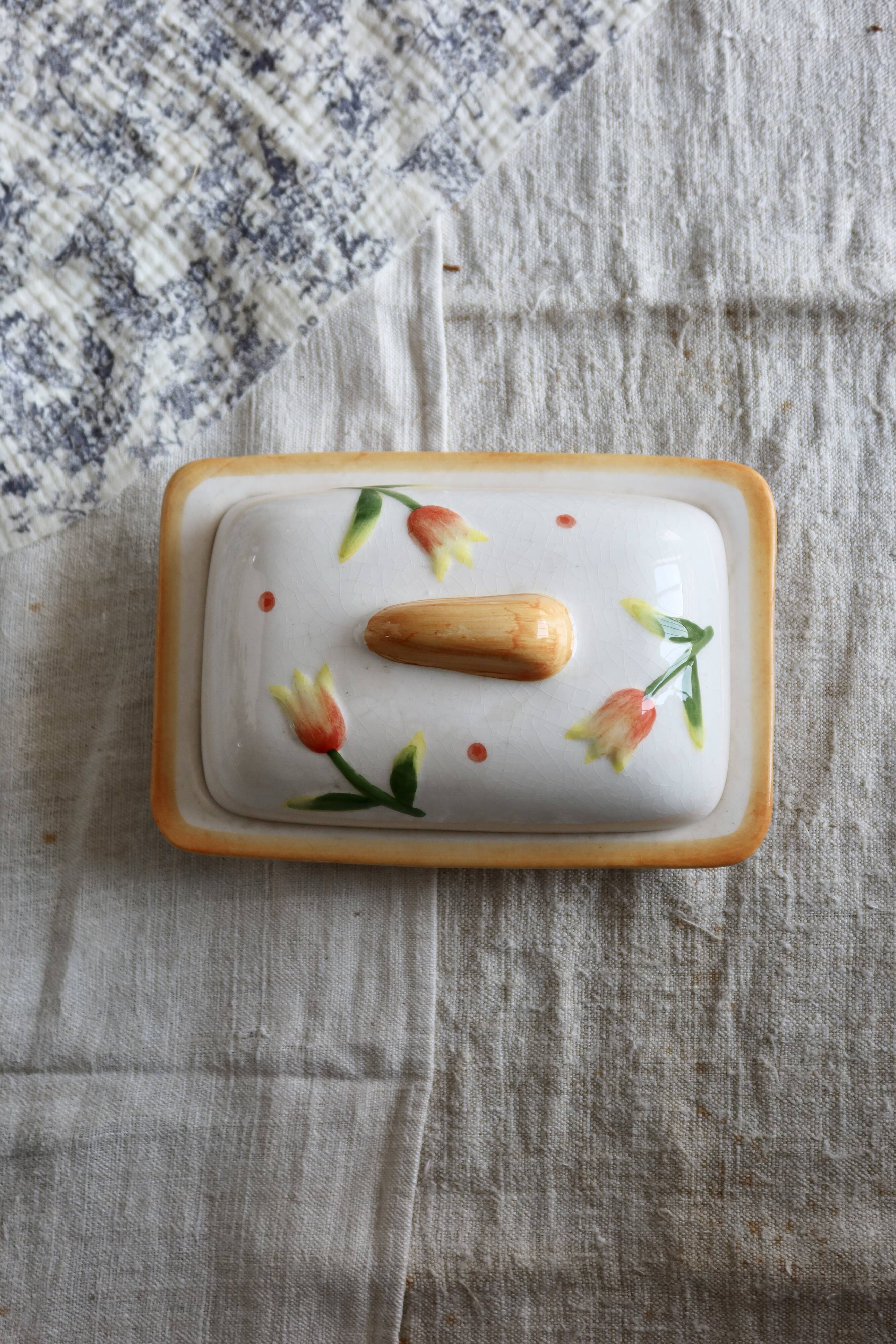 Vintage butter dish in earthenware and slip with tulip motif