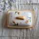 Vintage butter dish in earthenware and slip with tulip motif