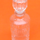 Cylindrical bottle "lever" transparent glass 1970