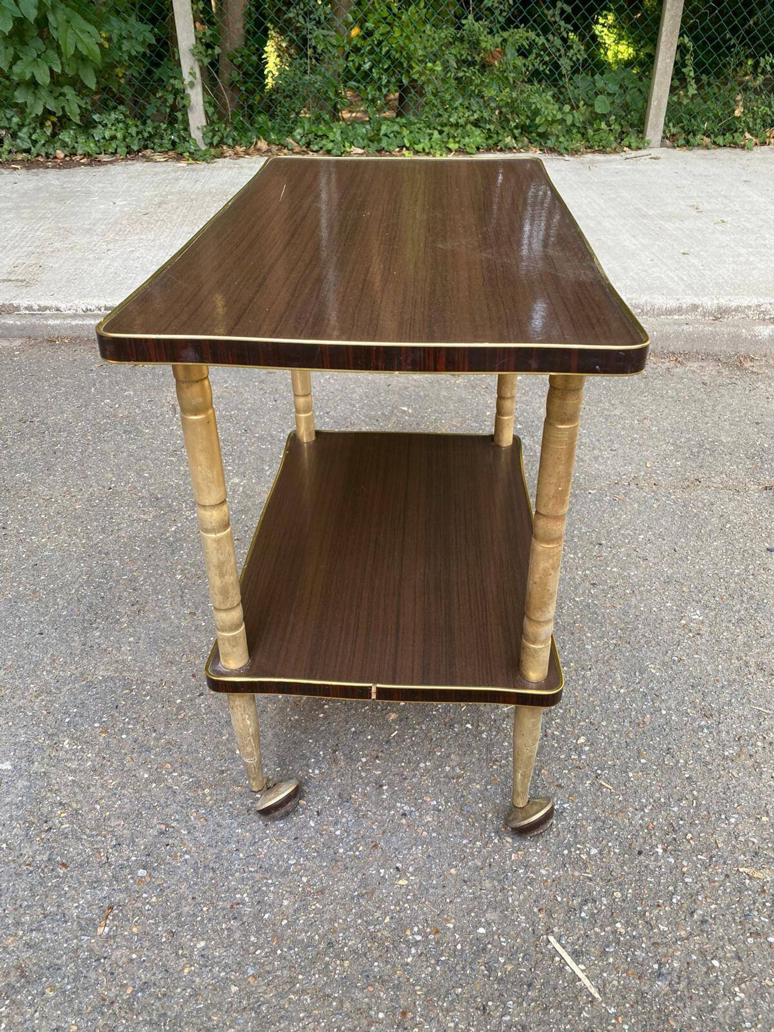 Double-tray rosewood serving trolley on gilded casters, 1970