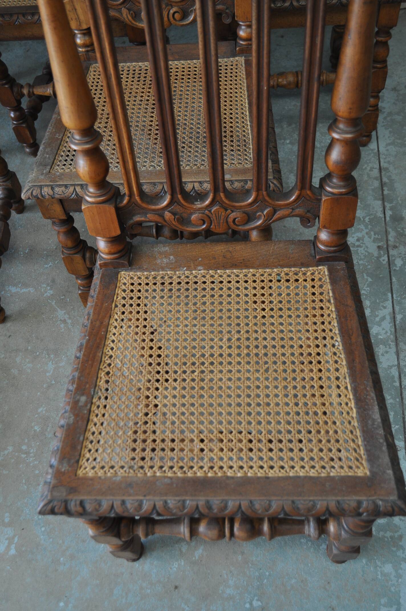 Set of 8 tanned chairs.