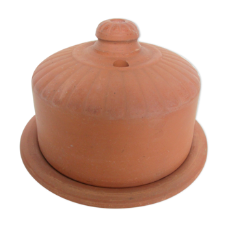 Old butter maker with water, terracotta