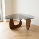Vintage organic coffee table in smoked glass and walnut.