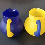 TWO VINTAGE YELLOW AND BLUE GLASS PITCHERS 1990