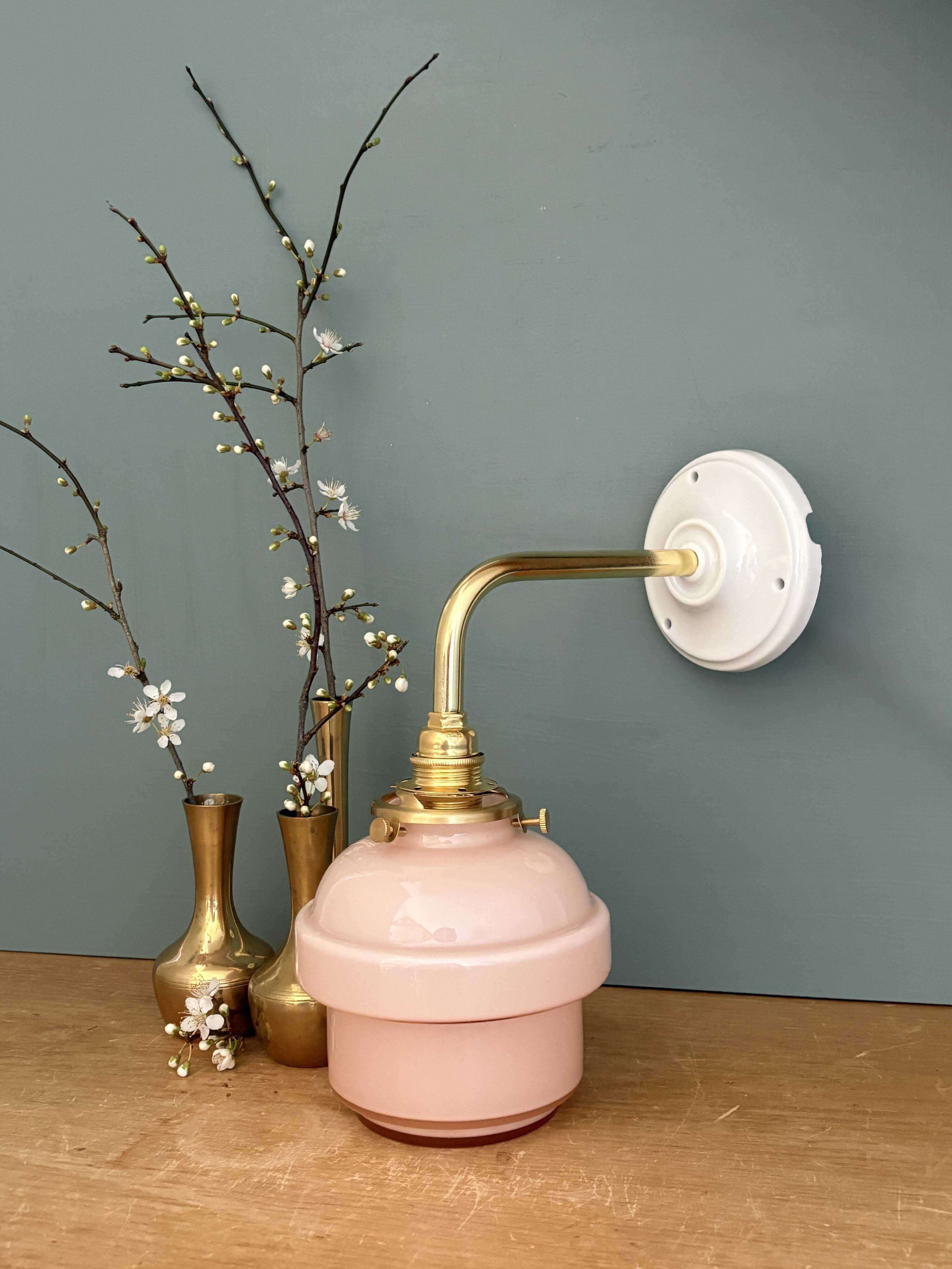 Vintage pink opaline globe wall light.