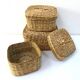 Vintage trio of small rattan nesting baskets