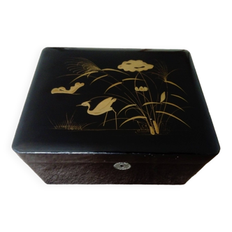 Black lacquered wooden jewelry box/box with gold decoration.