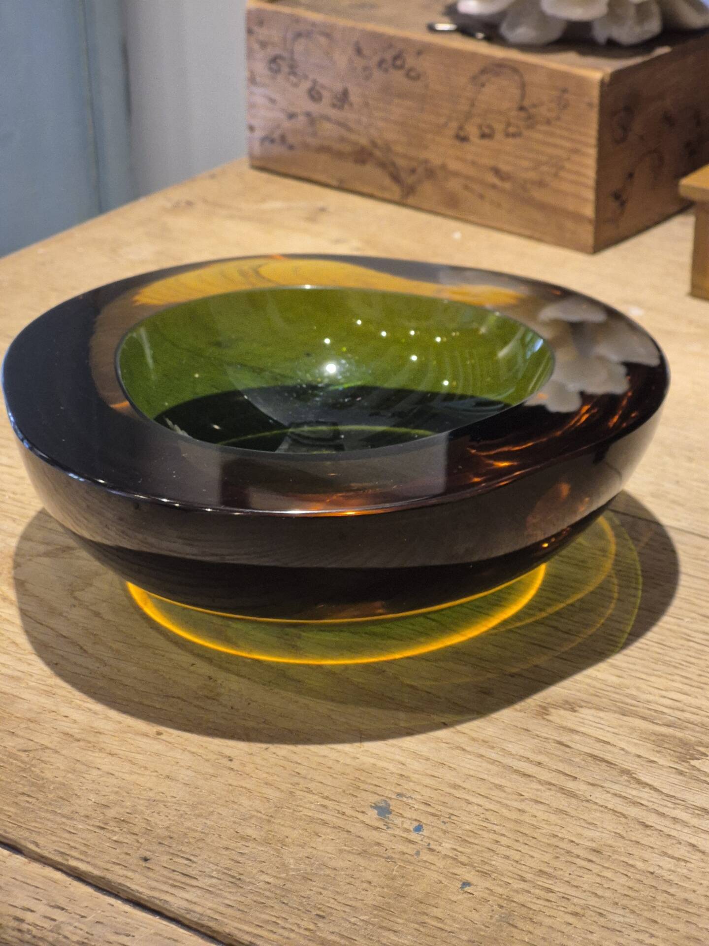 Large vintage Murano glass ashtray in olive green and amber.