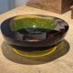 Large vintage Murano glass ashtray in olive green and amber.
