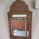 Mirror with parecloses