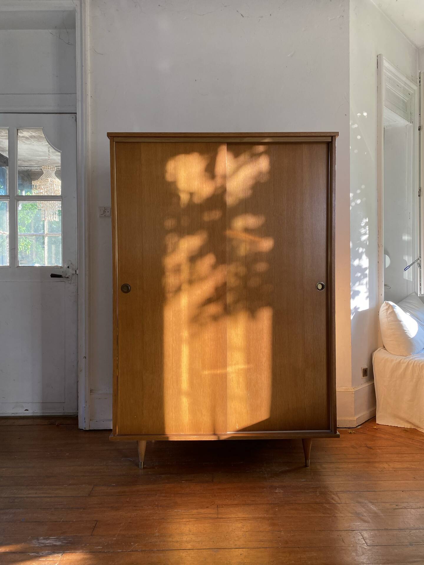 Large vintage Scandinavian wardrobe with two sliding doors.