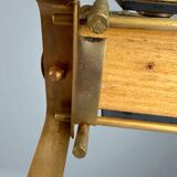 Magazine rack in brass and smoked glass, Maison Jansen style, 1950s