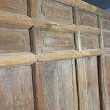 Old wooden door with its frame