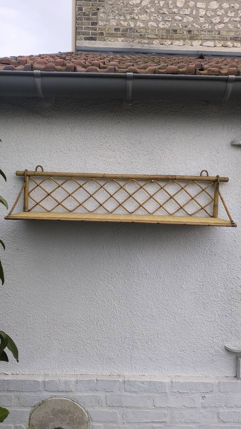 Vintage rattan wall shelf