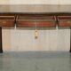 WARING & GILLOW library desk in the style of Thomas Chippendale with a leather top.