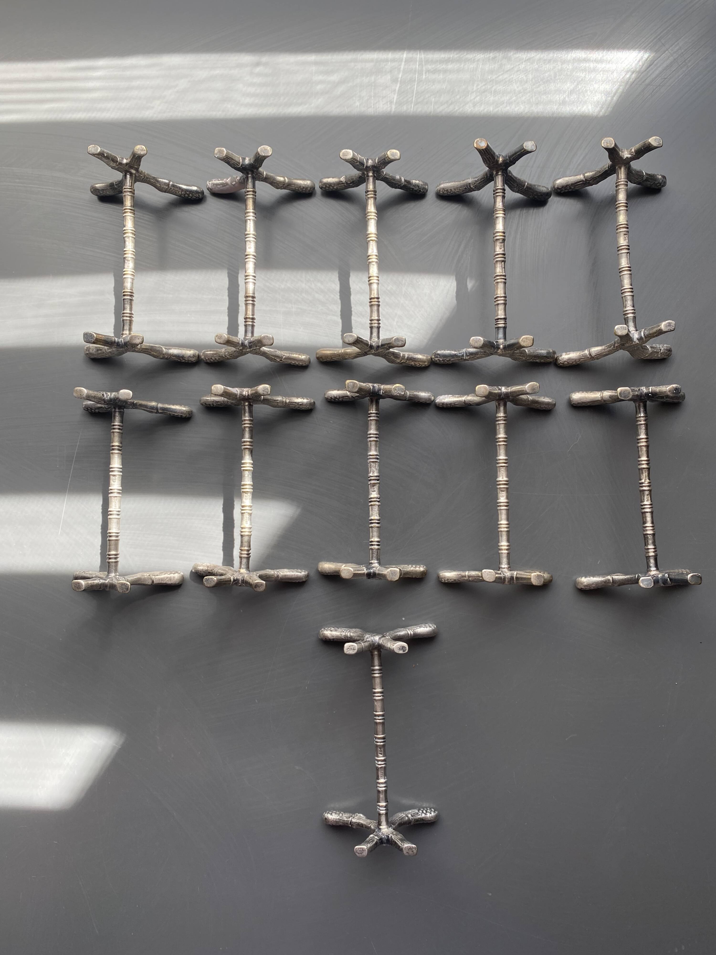 11 silver-plated metal knife rests, Art Nouveau, Morlot
