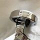 Vintage accordion wall light in chrome metal.