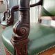Paire de fauteuils de style Empire en acajou et cuir vert