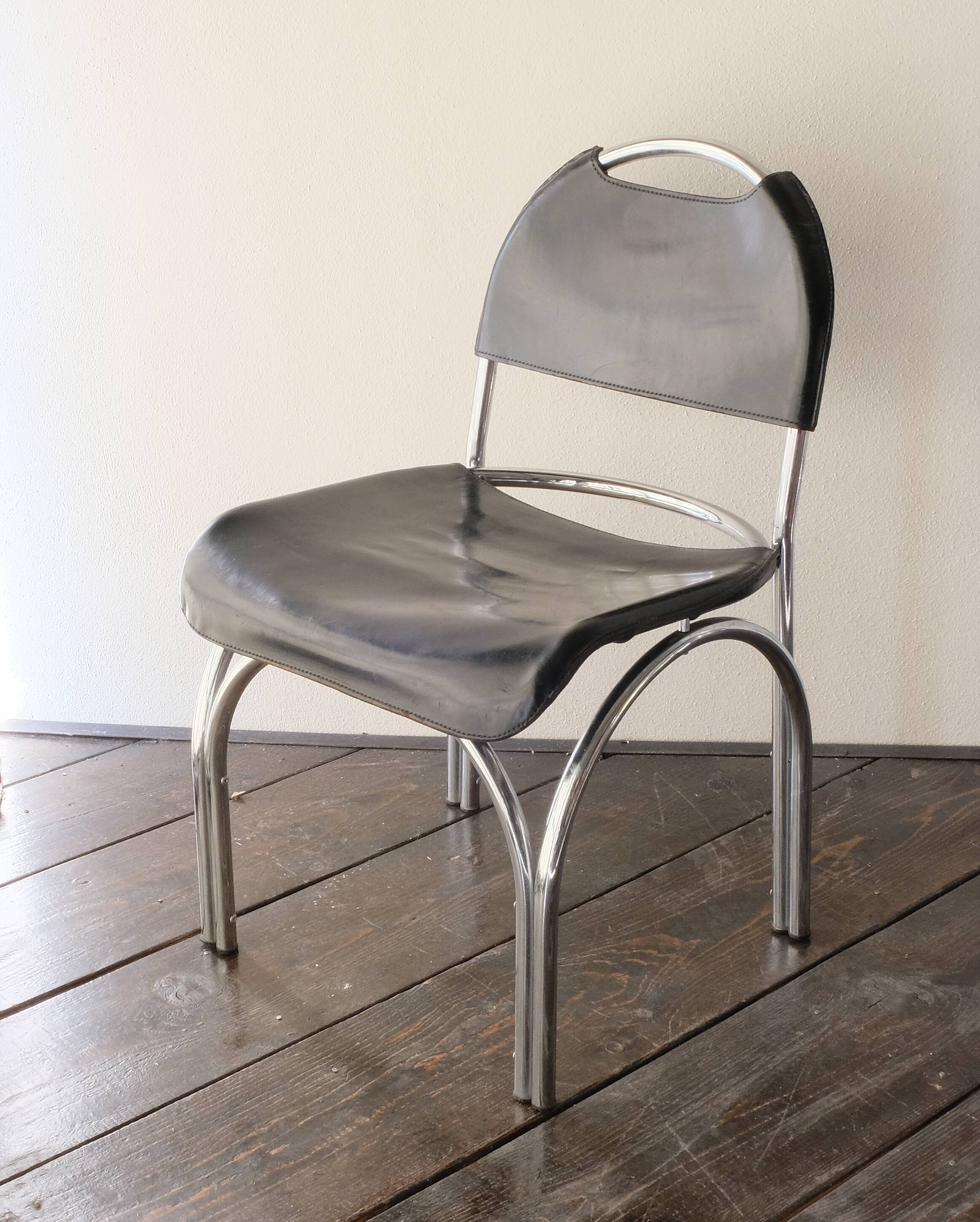 Chairs in black leather, '70