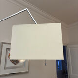 Cinna floor lamp in wood, chrome, and fabric.