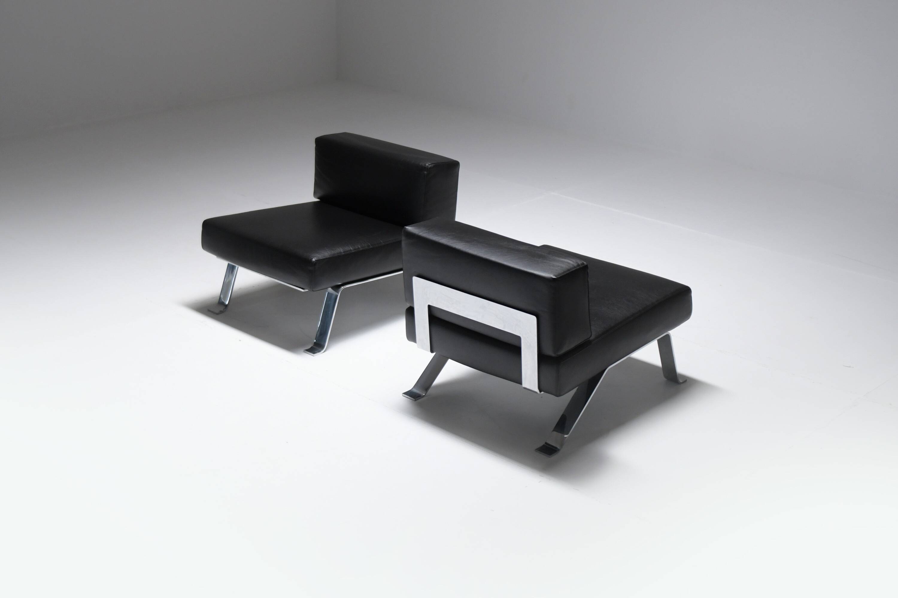Black leather Ombra 512 lounge chairs by Charlotte Perriand for Cassina Italy