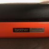Typewriter orange brother 210