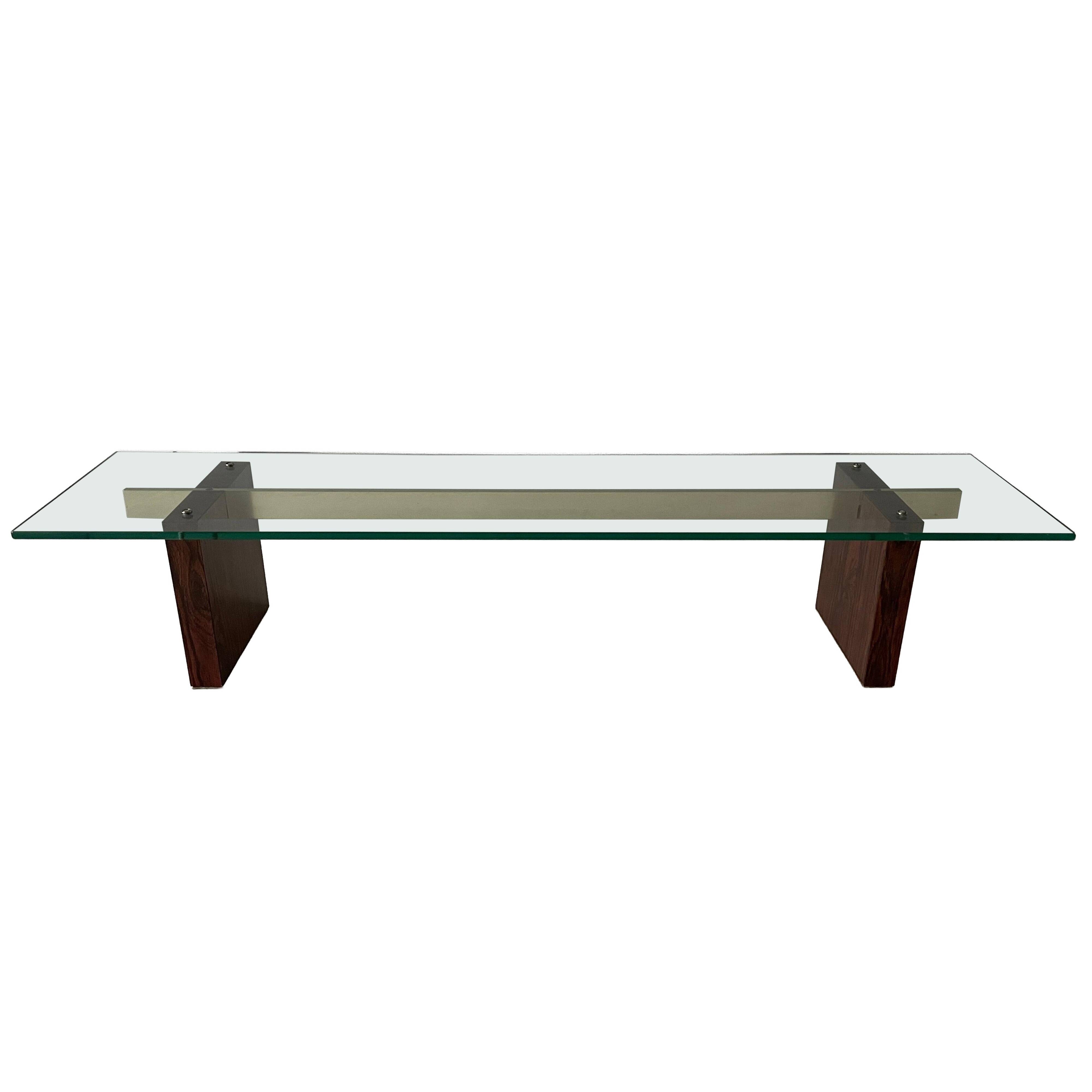 Mid-century minimalist thick glass coffee table, rosewood legs, 1960, Germany.