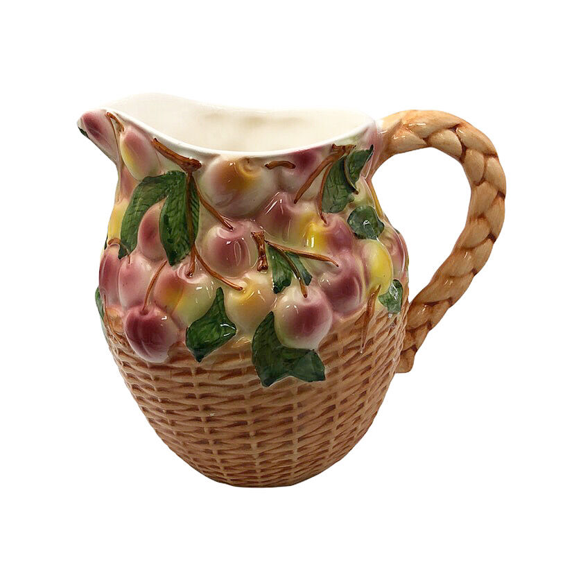 Vintage pitcher in cherry patterned dabbling