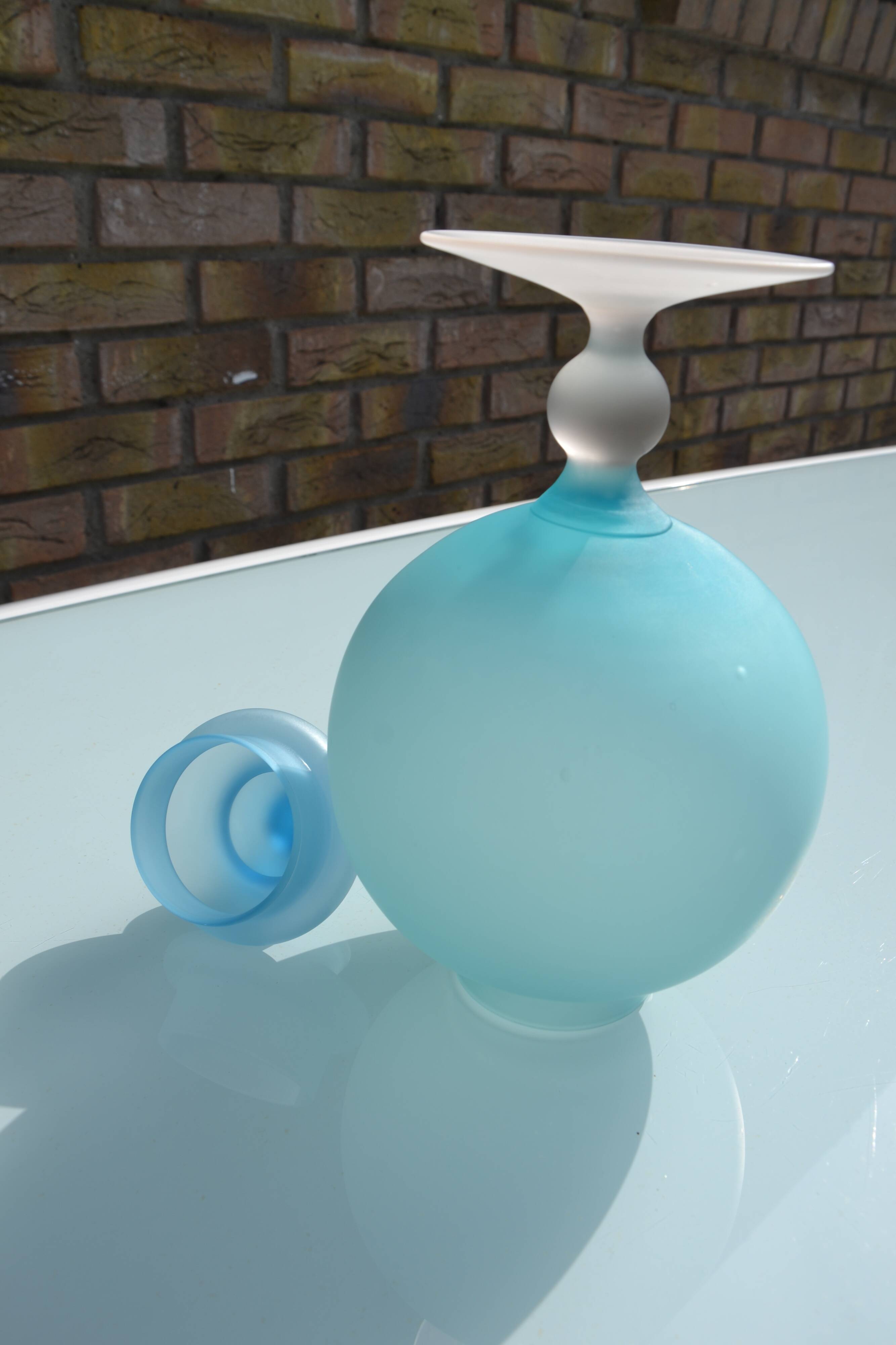 Blue frosted glass bottle/vase on foot
