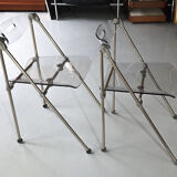 Pair of modern folding chairs in plexiglass