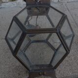 Old lantern in brass and glass with 8 facets or 24 stained glass windows