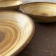 Lot de 4 assiettes creuses signées Longchamp