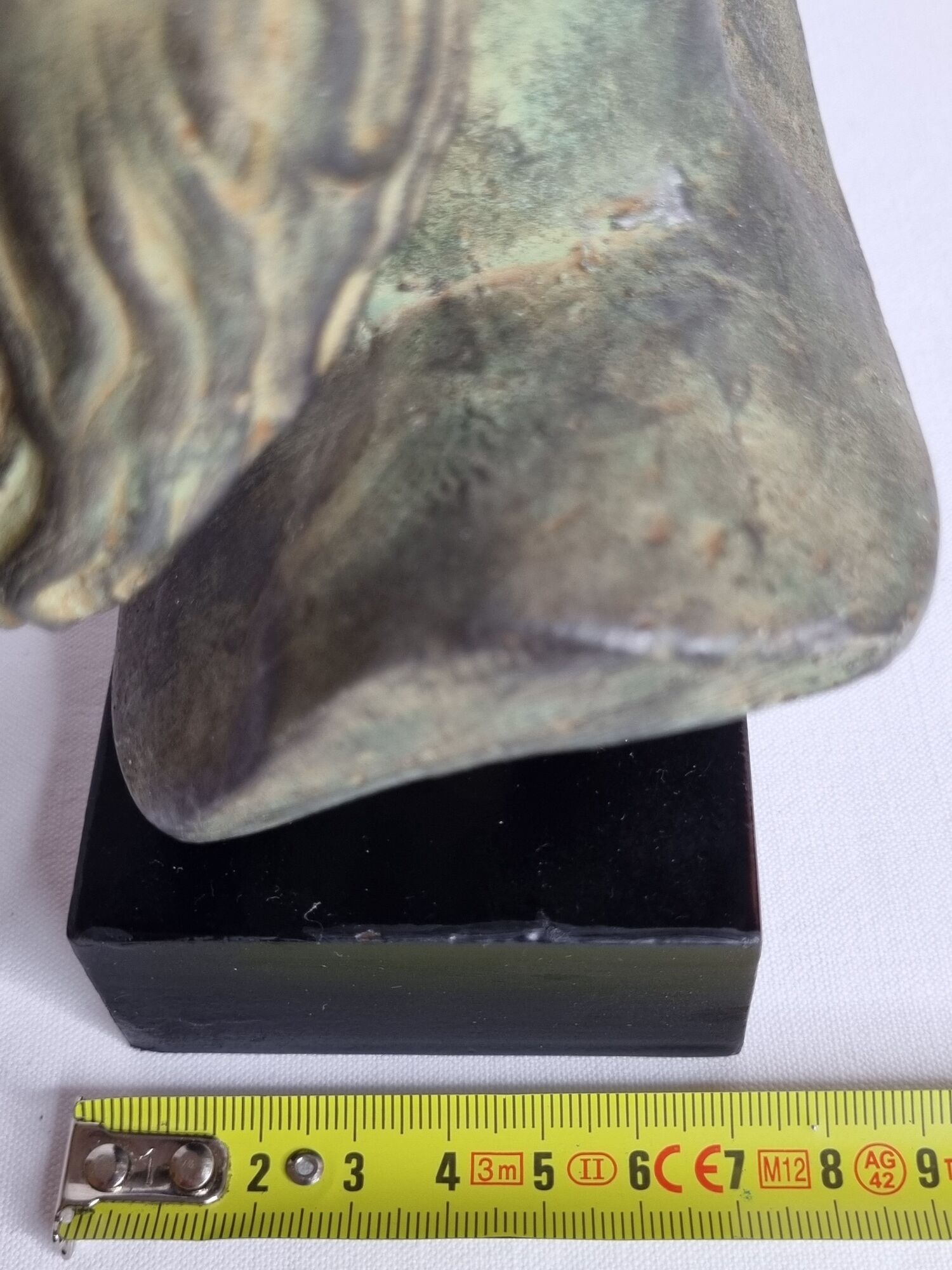 Bust of Poseidon in patinated plaster on wooden base